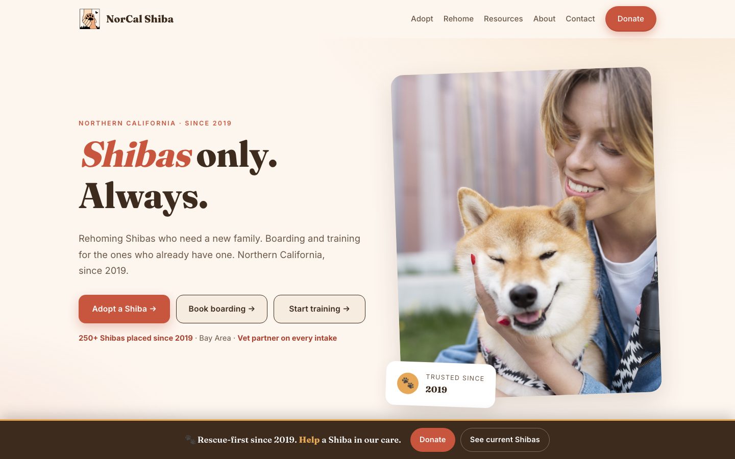 NorCal Shiba homepage: the headline Shibas only. Always., three buttons for adopting, boarding and training, and a photograph of a smiling Shiba with its owner.